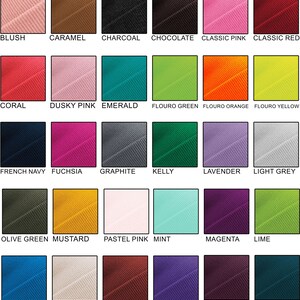 May include: A color chart showing 36 different fabric swatches. The swatches are arranged in a grid of six columns and six rows. Each swatch is labeled with a color name, such as "Aviator", "Black", "Bottle Green", and "Bright Red".