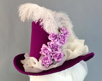 "Amazon" style hat in silk with decoration of feathers and flowers. Victorian hat. Victorian fashion. 1870. 1880. Reproduction
