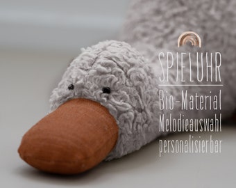 Spieluhr Ente Bio-Plüsch hellgrau / Leinen zimt / Melodieauswahl