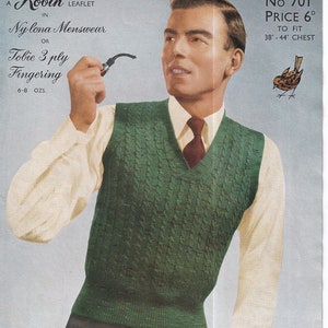 May include: A green knitted waistcoat with a cable knit pattern. The waistcoat has a V-neck and is worn over a white shirt with a burgundy tie. The text "No 701 PRICE 6d TO FIT 38-44 CHEST" is visible in the upper right corner of the image.