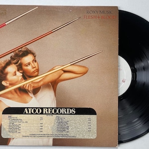 roxy music lp  flesh + blood     promo    vg+/m-