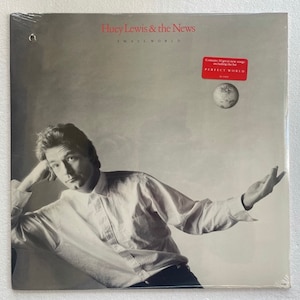 huey lewis and the news lp small world  SEALED/NEW