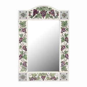 May include: A white rectangular mirror with a decorative frame featuring a grapevine design. The frame is painted with green leaves and purple grapes.