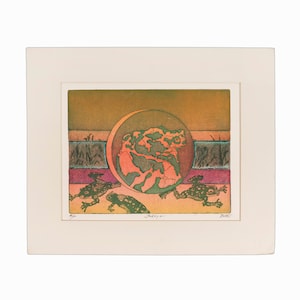 May include: A colorful print of a frog in a circle with three other frogs in the foreground. The print is on a cream-colored paper with the text "8/20" and "Jaleya" in the bottom left corner and "Dutt" in the bottom right corner.