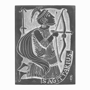 May include: Black and white illustration of a Sagittarius zodiac sign. The image shows a figure with a bow and arrow, with the text "IS SAGITTARIUS." below.