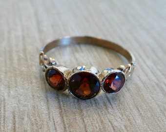 Victorian old cut garnet trilogy three stone milgrain bezel ring in rose gold with hand engraved details