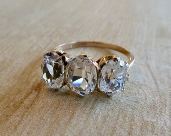 Antique Edwardian 14k Rose Gold Trilogy Ring with 4.53 carats of large Oval Old Cut White Sapphires