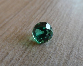 Stunning Fiery Old European Antique Hand Cut Emerald Round at 1.59 carats