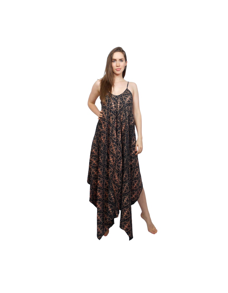 May include: A black maxi dress with a brown floral pattern. The dress has a V-neckline and thin straps. The dress is asymmetrical and has a flowing skirt.