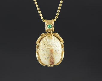 Gold pendant with ancient egyptian scarab