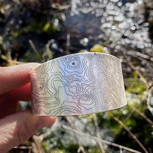 May include: A handmade wooden sign with the text "Welcome" in a playful font. The sign features a distressed finish and a simple, rustic design, perfect for a front door or entryway. The sign is rectangular and appears to be made of reclaimed wood.