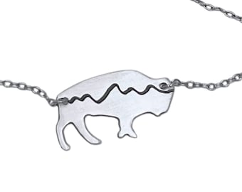 Mountains with Buffalo necklace. Naturally etched and hand finished. Great for the Bison lover!