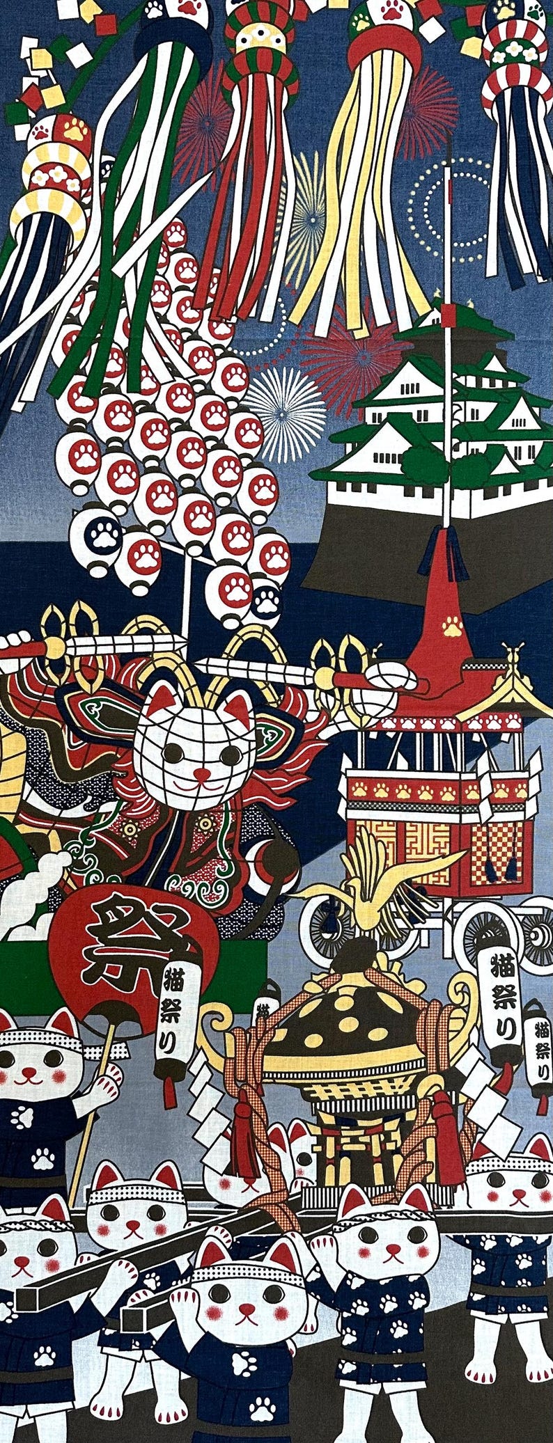 May include: A colorful illustration of a Japanese festival with white cats carrying a shrine on their shoulders. The cats are wearing blue and white outfits with paw prints. The background features fireworks, lanterns, and traditional Japanese decorations.