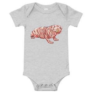 May include: A gray baby onesie with a cartoon illustration of a pink naked mole rat with large teeth.