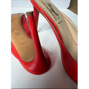 Bruno Magli leather mules with a gold-tone hardware plaque image 8