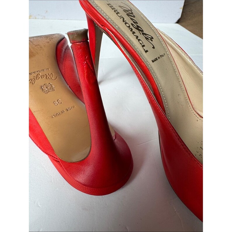 Bruno Magli leather mules with a gold-tone hardware plaque image 8
