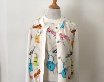 1990 Starington silk top and cardigan ensemble in off white color with pink green blue shoes bags print knitted sleeves and trims