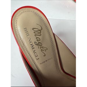 Bruno Magli leather mules with a gold-tone hardware plaque image 5