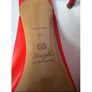 Bruno Magli leather mules with a gold-tone hardware plaque image 7