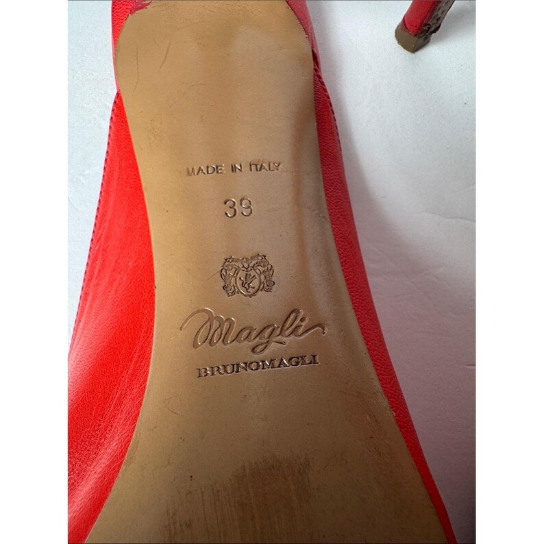 Bruno Magli leather mules with a gold-tone hardware plaque image 7
