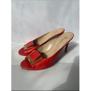 Bruno Magli leather mules with a gold-tone hardware plaque image 2