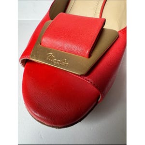 Bruno Magli leather mules with a gold-tone hardware plaque image 10