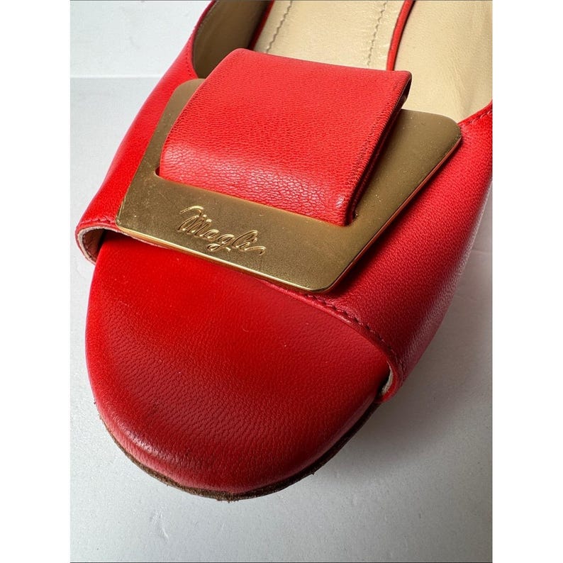 Bruno Magli leather mules with a gold-tone hardware plaque image 10