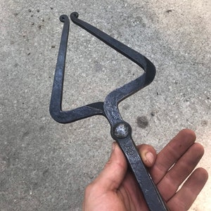 Blacksmith hammer tongs