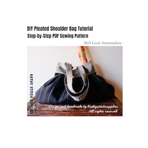 May include: A DIY pleated shoulder bag tutorial with a step-by-step PDF sewing pattern. The bag is dark blue with a striped pattern and a decorative strap. The skill level is intermediate. The text "KATHY STITCH SUPPLIES" is visible.
