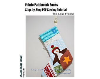 May include: A fabric patchwork Christmas stocking featuring a penguin graphic, a blue cuff with the letter D, and a yellow star. The text reads Fabric Patchwork Socks Step-by-Step PDF Sewing Tutorial Skill Level: Beginner KATHY STITCH SUPPLY HOME2003.