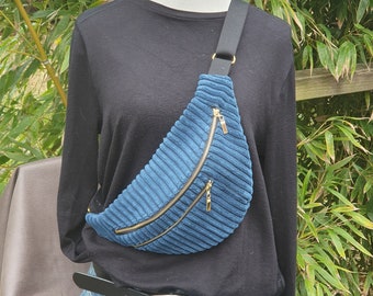 Multi-pocket belt bags in coarse ribbed velvet. Blue, Pink, Green.