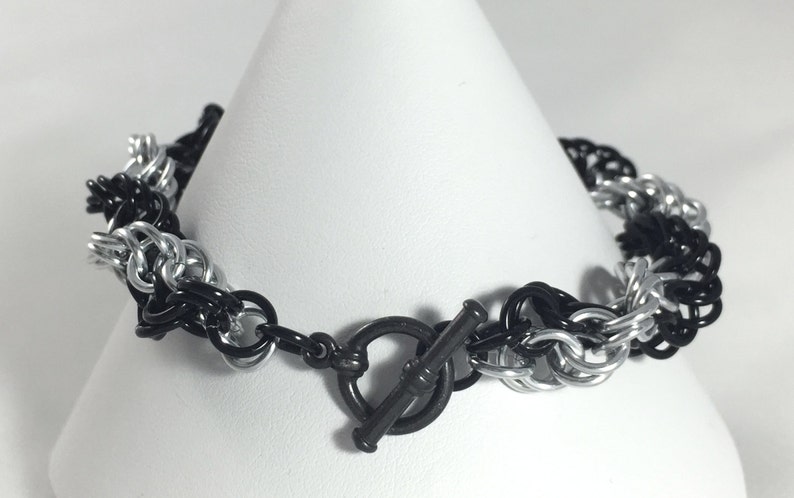 Inverted Spiral Chainmaille Bracelet Black and Silver Anodised Aluminium