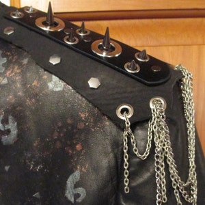 Steampunk black leather jacket with painted gear pattern and studded and spiked leather epaulet  womans size 12