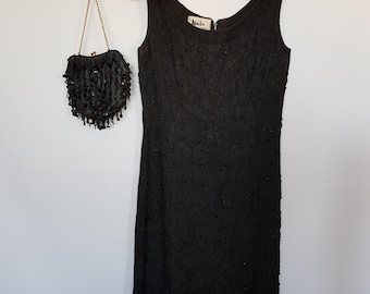 1960's vintage' Little black dress' in a UK size 12/ 14, US size  8/10 with matching sequinned purse