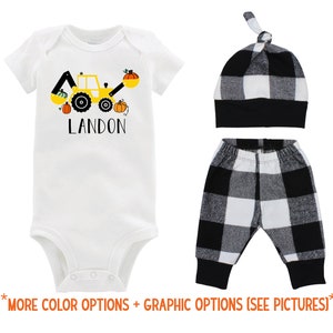 May include: A white bodysuit with a yellow tractor carrying pumpkins and the name Landon printed on the front. The outfit also includes black and white checkered pants and a black and white checkered hat.