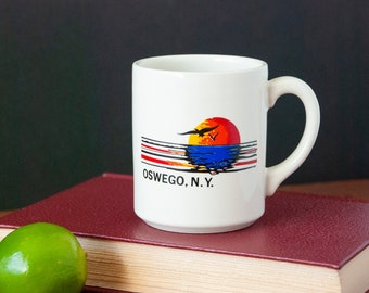 Oswego New York Souvenir Coffee Mug / Retro Graphic of Gulls and Sunrise Over Water / Vintage Drinkware