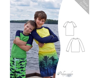 May include: Two boys wearing rash guards, one in green and blue, the other in yellow and blue. The boys are standing in front of a lake.  The image also shows a line drawing of two rash guards, one short-sleeved and one long-sleeved. The text "New Sizes!" is in the upper right corner of the image. The text "Pollywoggles" is in the lower right corner of the image.