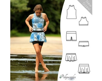 May include: A young person wearing a blue and white patterned halter top and skirt over black shorts. The outfit is part of a swimwear set. The image also shows line drawings of the swimwear pieces, with the text "New Sizes!" and the Pollywoggles logo.