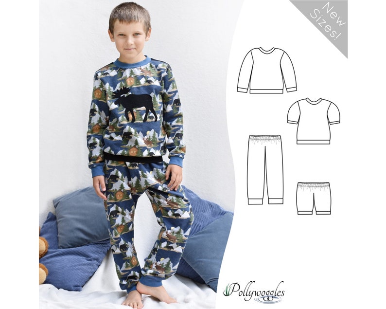 May include: A blue and green pajama set with a moose print. The set includes a long-sleeved top and pants. The top has a round neckline and the pants have an elastic waistband. The pattern features a moose, trees, and cabins. The text "New Sizes!" is visible in the upper right corner of the image.