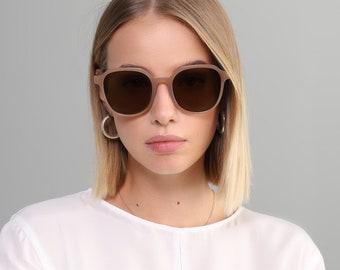 Oversized round sunglasses for women in beige, black, orange, maroon color with UV400 protection lenses