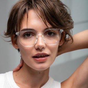 Monture de lunettes transparentes pour femmes avec verres correcteurs ou sans ordonnance (antireflets, bloquant la lumière bleue, photochromiques, solaires)