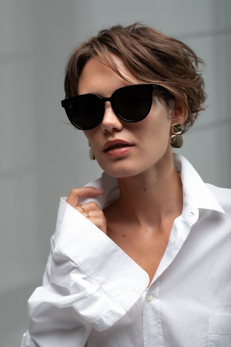 Modern sunglasses women with a unique design with polarized lenses UV400 protection