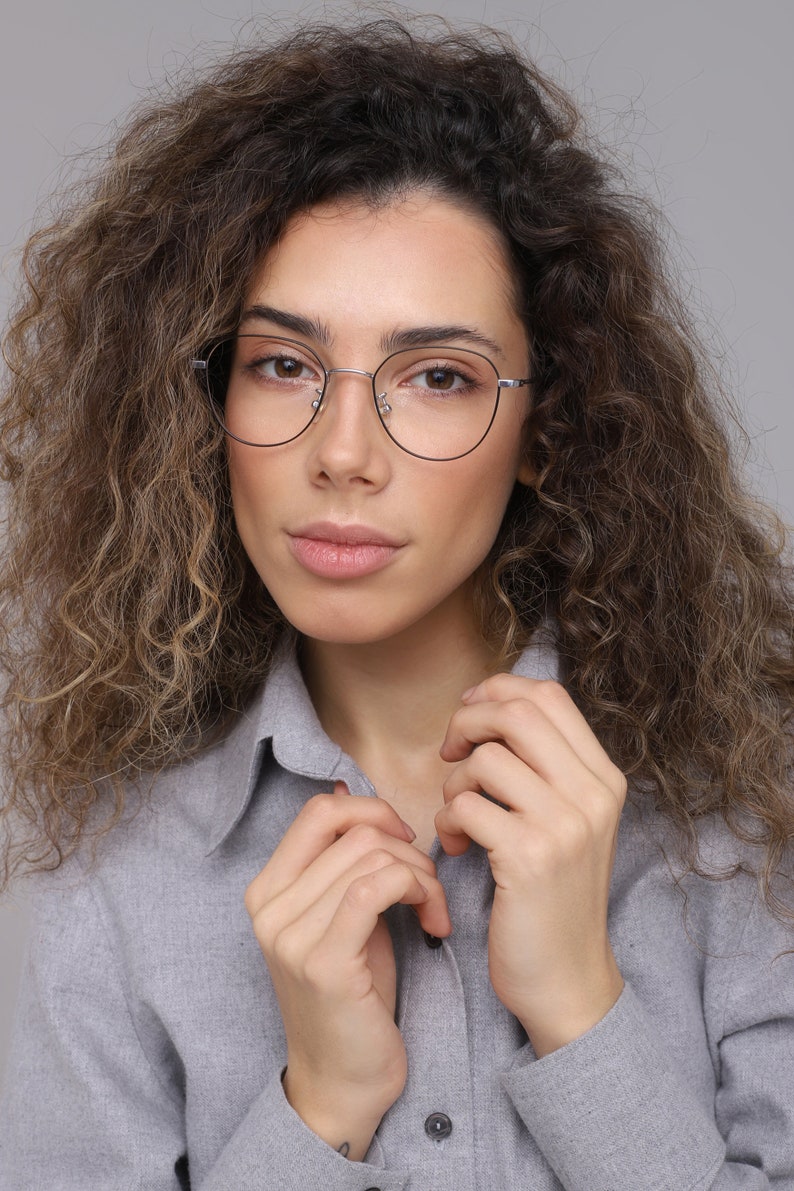 Mod prescription or non prescription black/silver metal reading glasses frames for women with lenses (anti-reflective, blue light blocking, photochromic, sun).

Frame width 137 mm 
Bridge 21 mm 
Height 49 mm 
Temple length 140 mm