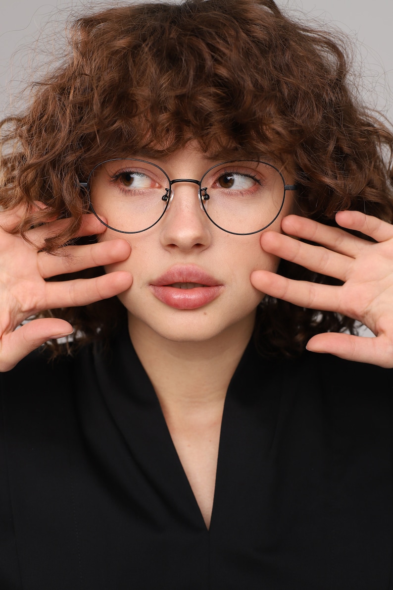 Round mod glasses frames for women with non prescription or prescription lenses with a unique design.