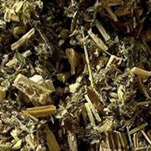 May include: Close-up of dried herbs, featuring a mix of green, brown, and tan plant matter. The image shows a variety of textures, including small leaves and larger, segmented pieces. The overall appearance suggests a natural, organic product.