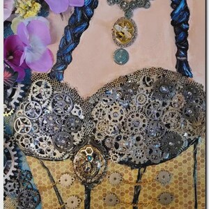 May include: A mixed media artwork featuring a bodice adorned with numerous metallic gears and cogs, a central bee-themed pendant, and a necklace with a bee charm. The piece includes blue braided hair elements, purple fabric flowers, and a honeycomb pattern.