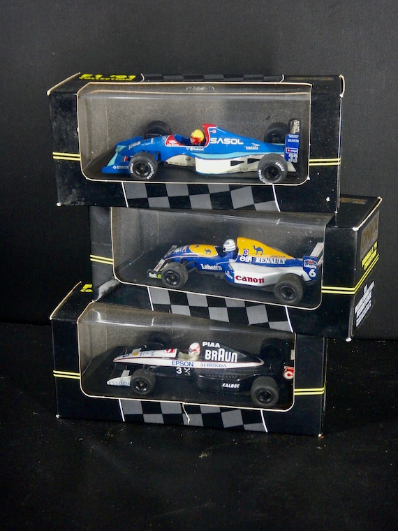 A Collection of 3 Vintage 1991 Formula One Cars - Onyx F1 Cars