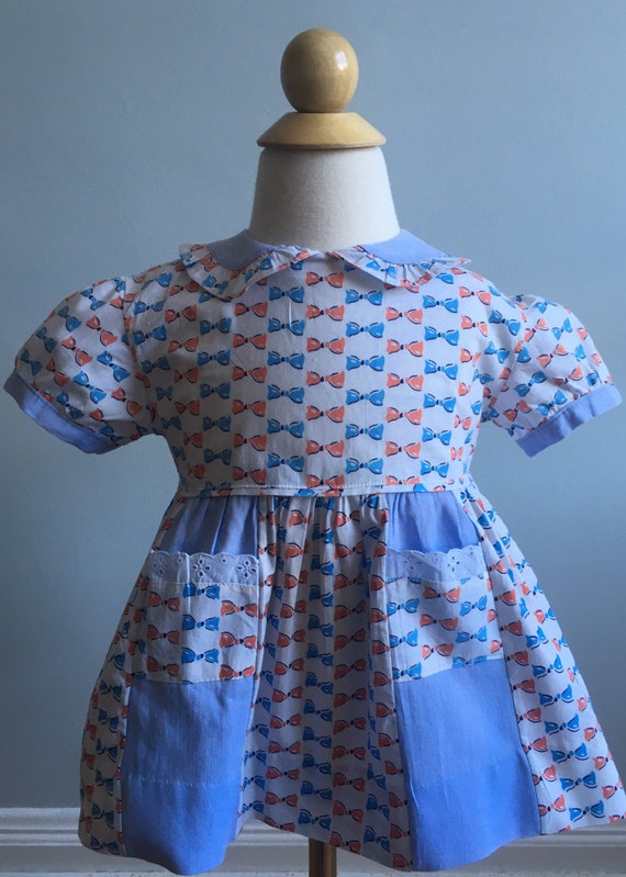 Vintage 1950’s “Bow” Printed Toddler Dresss