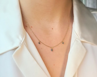 Natural blue/green diamond and 14K gold dainty necklace.