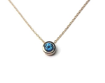 Montana Sapphire 14k yellow gold sliding bezel pendant. gold sliding pendant. Montana Sapphire necklace